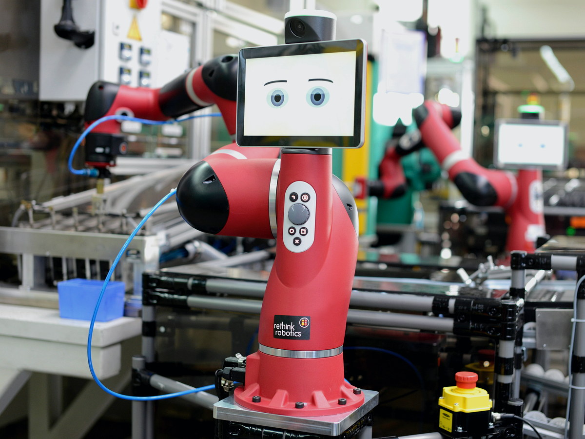 Collaborative robot handling components on an active factory floor