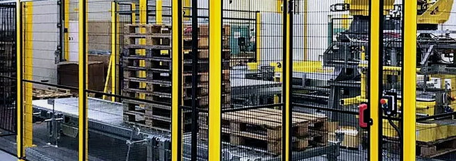 Installed perimeter guarding protecting an industrial robot cell