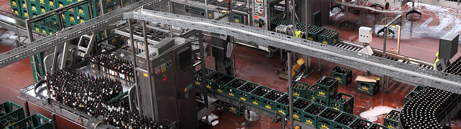 Operating packaging line filling and handling products in a live production environment